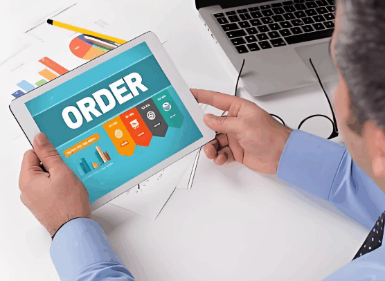 Businessman using tablet to place online FTL freight order on logistics platform