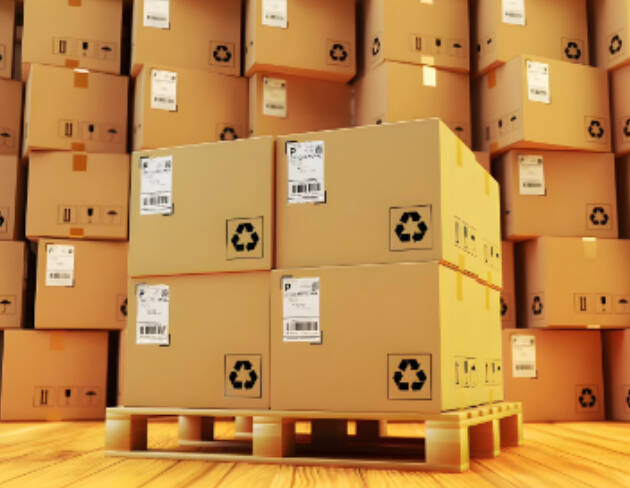 Stacked cardboard boxes prepared for FCL shipment and international delivery