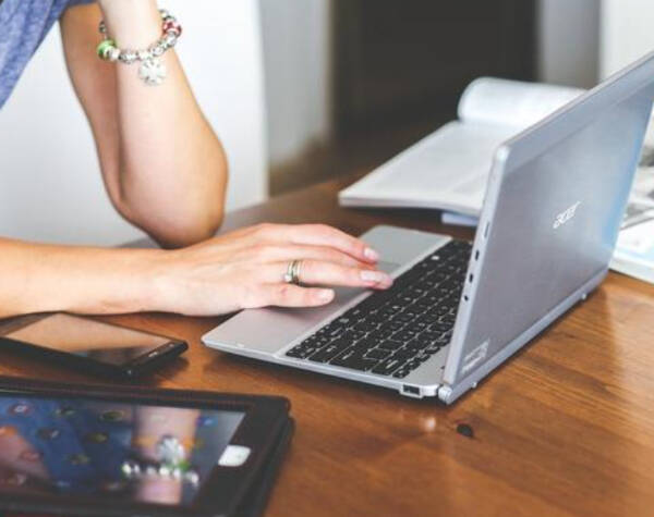 User booking international air freight shipment online using a laptop