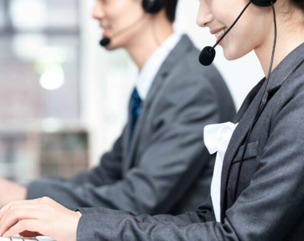 Air freight customer service agents providing logistics support and shipment consultation